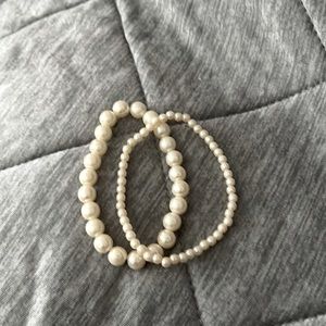Two peral bracelets